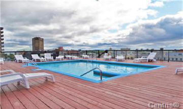 Rooftop terrace and swimming pool at 825 Rene Levesque condo building