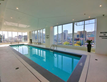 Indoor Swimming Pool in Icone building overlooking the city